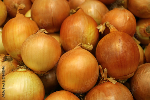 Heap of onions selling at the market
