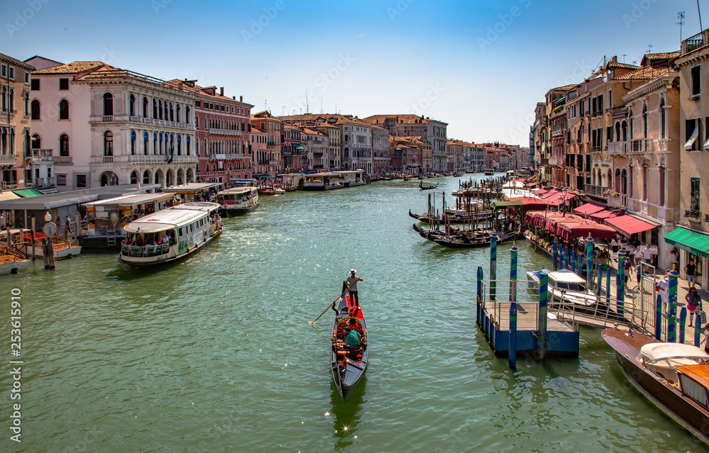 Italy beauty, view with gondola from famous canal bridge Rialto in Venice , Venezia
