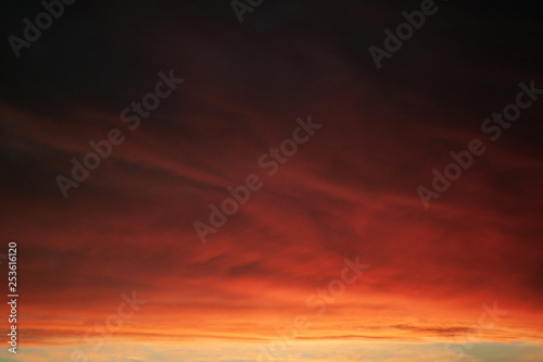 red sunset with clouds © pauelstv