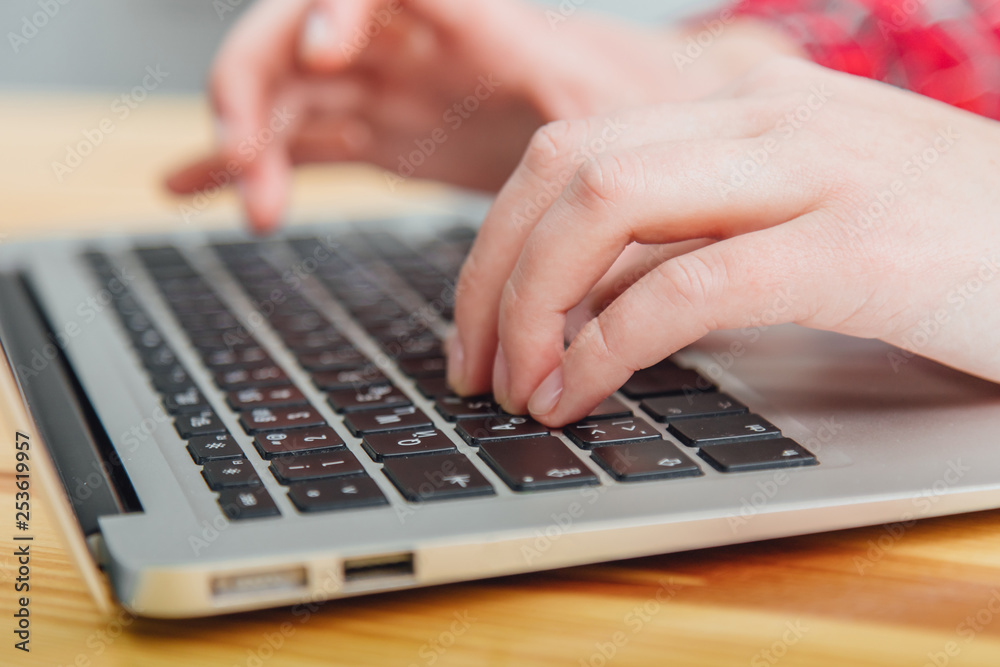 Woman using a laptop, surfing the web, viewing information while having a workplace at home. Blurred trick drawing. Vintage concept. Woman using a laptop, surfing the web, viewing information while having a workplace at home. Blurred trick drawing. Vintage concept.