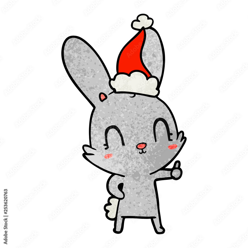 cute textured cartoon of a rabbit wearing santa hat cute textured cartoon of a rabbit wearing santa hat
