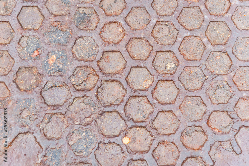 hexagons embossed pattern on a wet metal surface hexagons embossed pattern on a wet metal surface