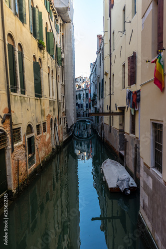 Italy, Venice, a narrow canal in a city