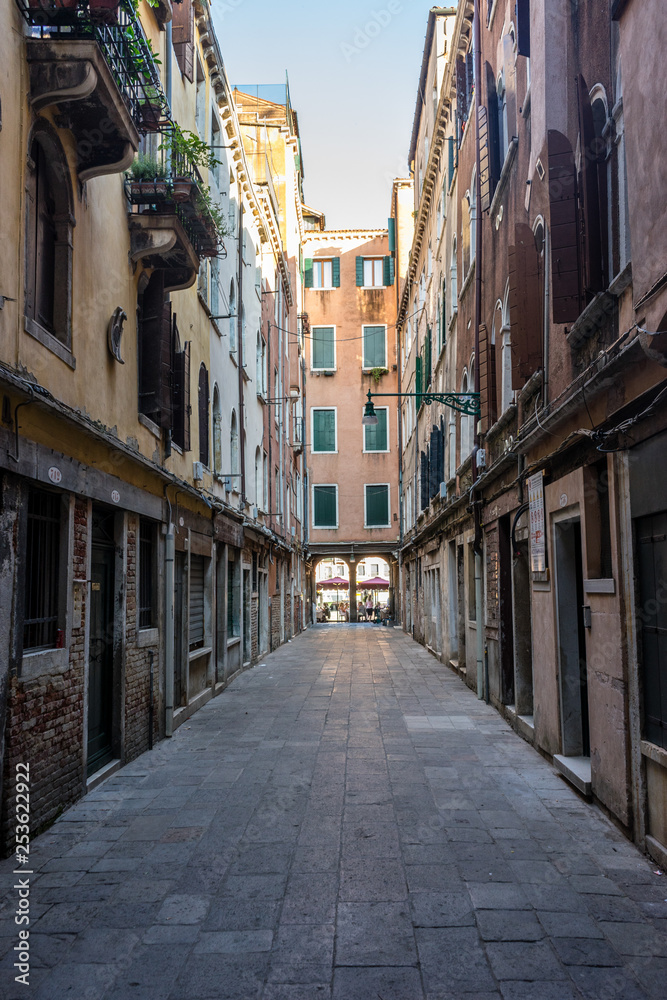 Italy, Venice, a narrow city street