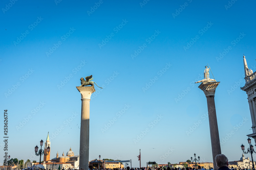 Italy, Venice, Church of San Giorgio Maggiore, LOW ANGLE VIEW OF STATUE AGAINST BLUE SKY