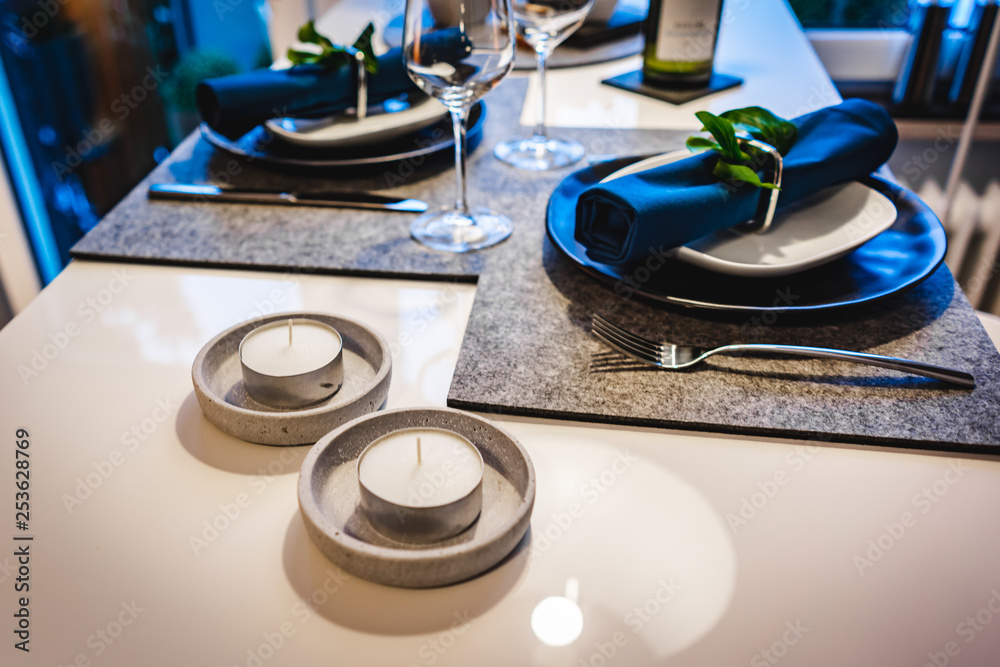 Fototapeta premium Beautiful modern interior design. Apartment inside view. Candle on a table.