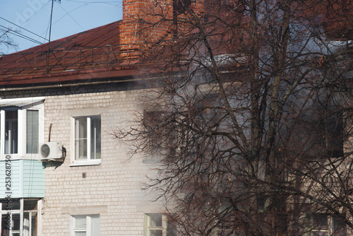 Smoke from the window of a burning apartment © dmitriydanilov62