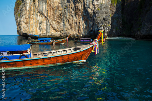 Traditional longtail boat on the way to famous Maya Bay beach in Koh Phi Phi Island, Thailand