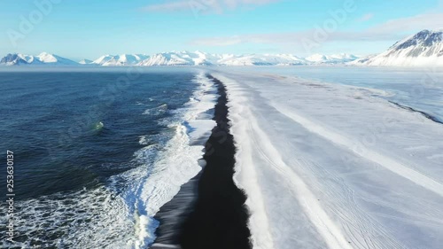 4K aerial footage of a beautiful snowy coastline