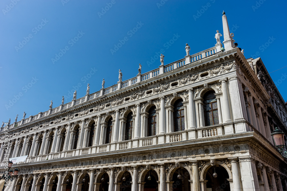 Italy, Venice, Biblioteca Marciana, a large stone building with Biblioteca Marciana in the background