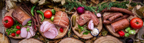 Assortment of cold meats: sausages, ham, bacon