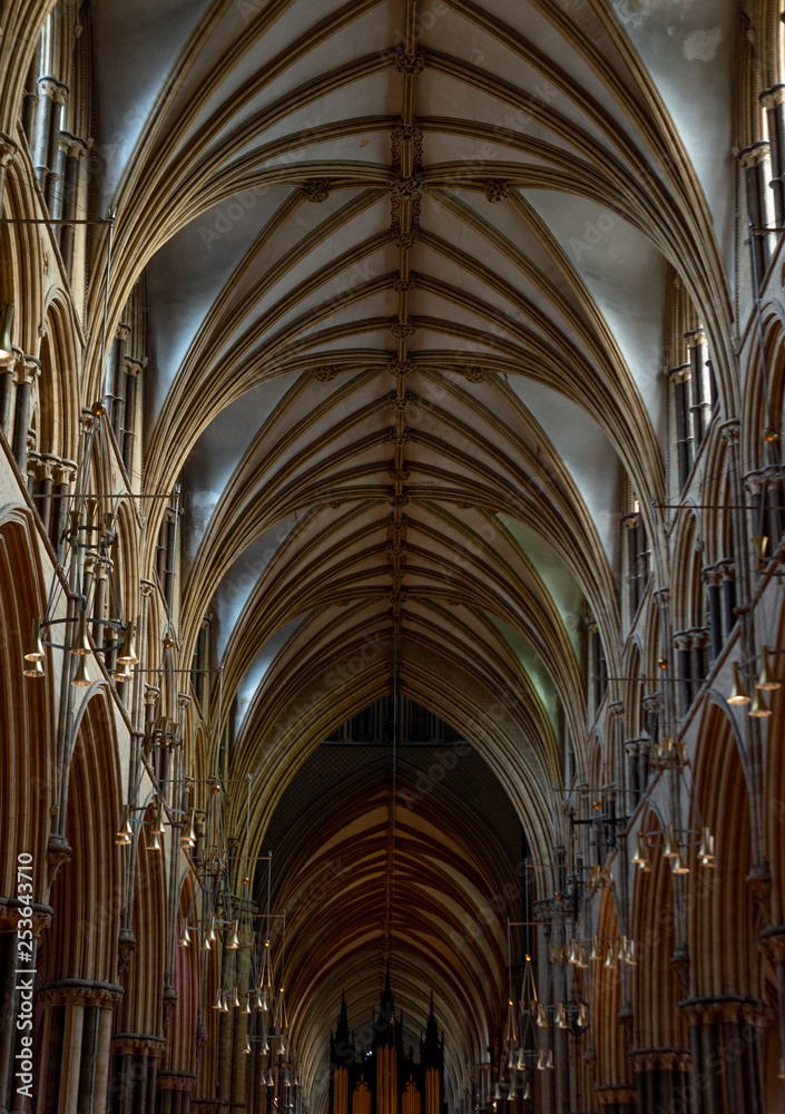 A low shot inside of the ceiling of Lincoln Cathedral showing the amazing decorations