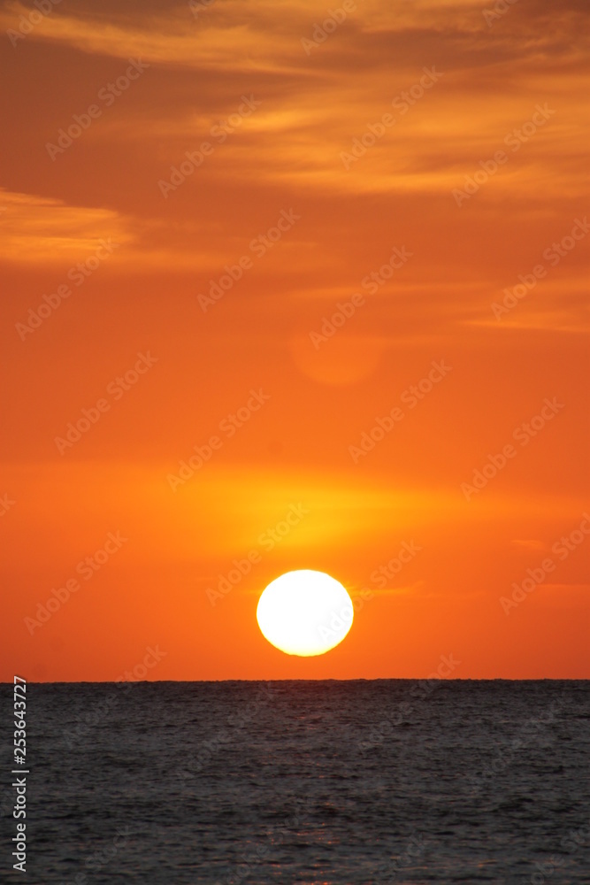 sunset ocean big sun orange