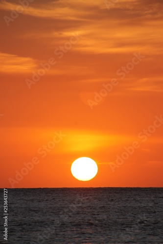 Fototapeta Naklejka Na Ścianę i Meble -  sunset ocean big sun orange