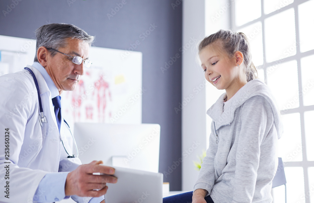 Portrait of a cute little girl and her doctor at hospital Portrait of a cute little girl and her doctor at hospital