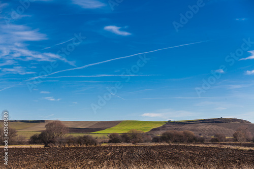 Landscape of farm fields with blue sky