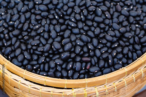 Black beans in basket, selective focus