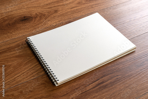 Blank catalog portrait catalog book mock up on wood branding identity magazines