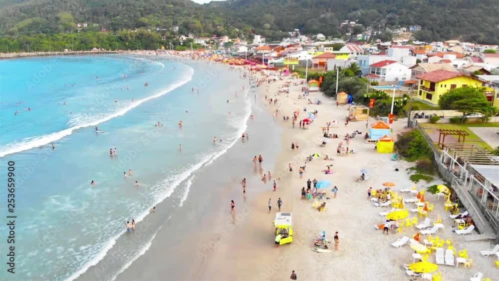 An aerial top view of a beach in Brazil people enjoying - Dolly front An aerial top view of a beach in Brazil people enjoying - Dolly front