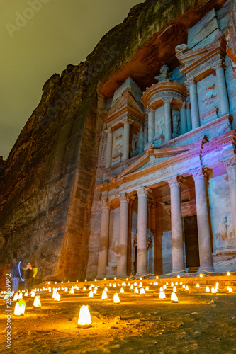 Petra by night tour featuring illuminated Al Khazneh tomb also called Treasury at Petra, Jordan photo