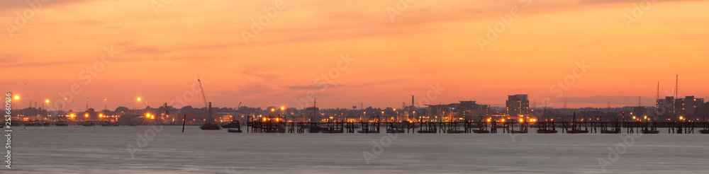 Sunset over Poole Harbour jetty Sunset over Poole Harbour jetty