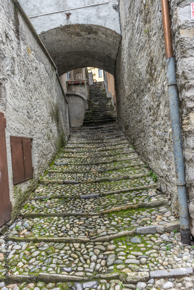 Italy, Varenna, Lake Como, STAIRCASE LEADING TO WALL OF BUILDING Italy, Varenna, Lake Como, STAIRCASE LEADING TO WALL OF BUILDING
