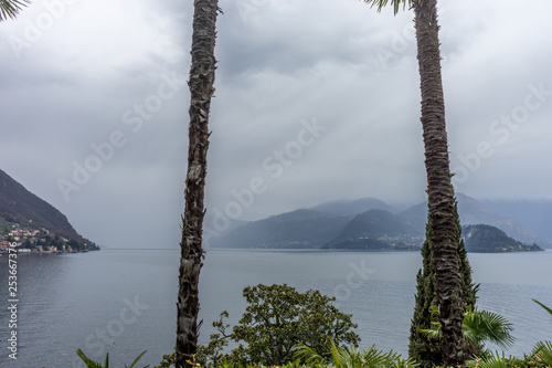 Italy, Varenna, Lake Como, a large body of water surrounded by trees