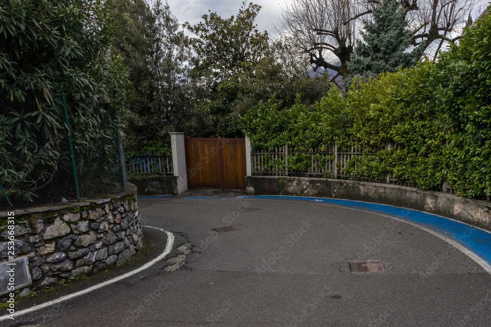 Italy, Varenna, Lake Como, VIEW OF FOOTPATH IN PARK Italy, Varenna, Lake Como, VIEW OF FOOTPATH IN PARK