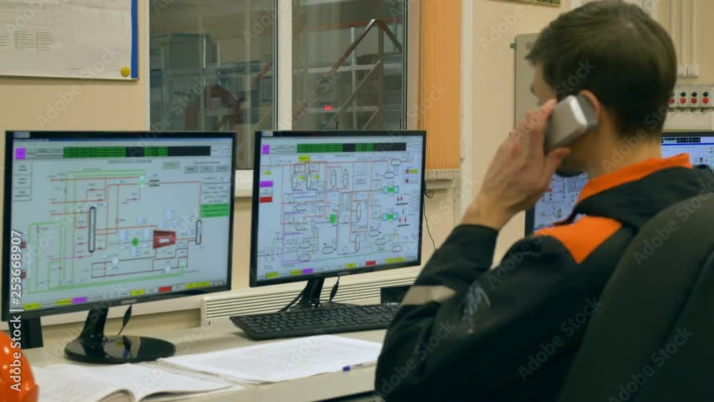 Inside the Heavy Industry Factory Engineer Working dashboard in the control room