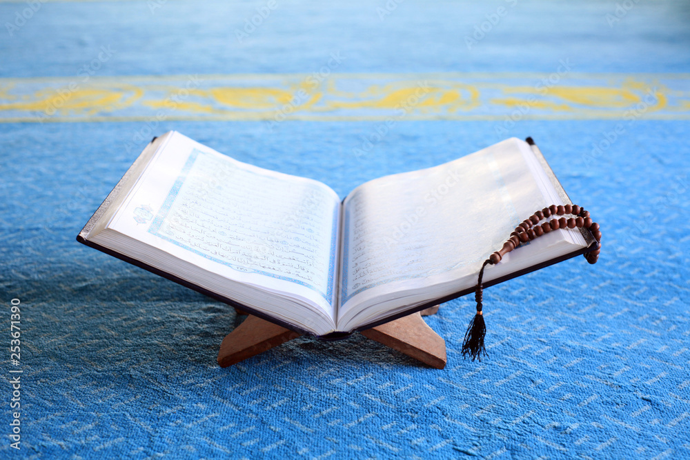 The holy Quran on mosque background The holy Quran on mosque background