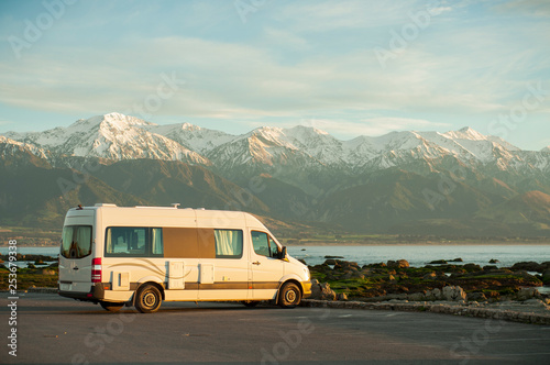 It is a photograph of a camping van taken in Kaikoura, New Zealand.