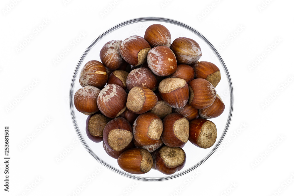 Hazelnuts in a glass bowl Hazelnuts in a glass bowl
