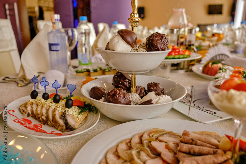 festive food on the table. A collage of different food in a restaurant. The concept of healthy eating and diet festive food on the table. A collage of different food in a restaurant. The concept of healthy eating and diet