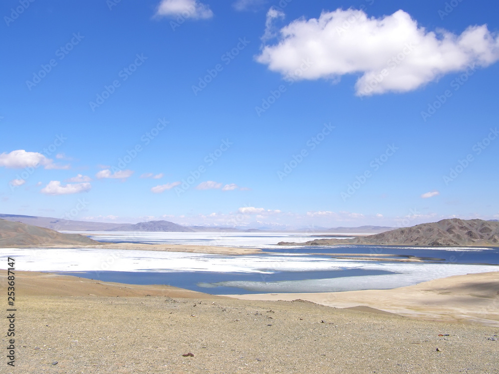Mongolian natural landscapes surrounded by mountains and rocks.