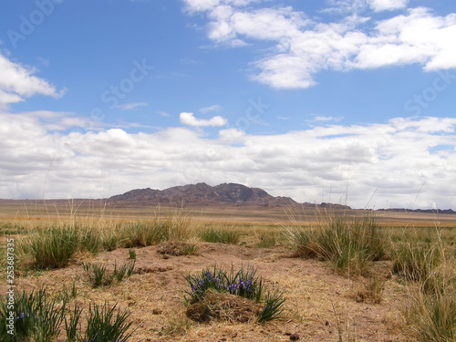 Mongolian natural landscapes surrounded by mountains and rocks.