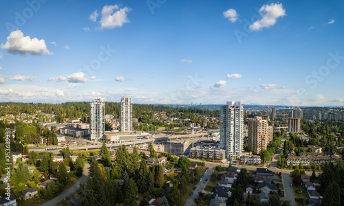 Aerial view of residential homes in a modern city during a vibrant summer sunny day. Taken in Port Moody, Vancouver, BC, Canada.