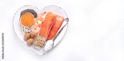 Sources of omega 3 in heart shape plate photo