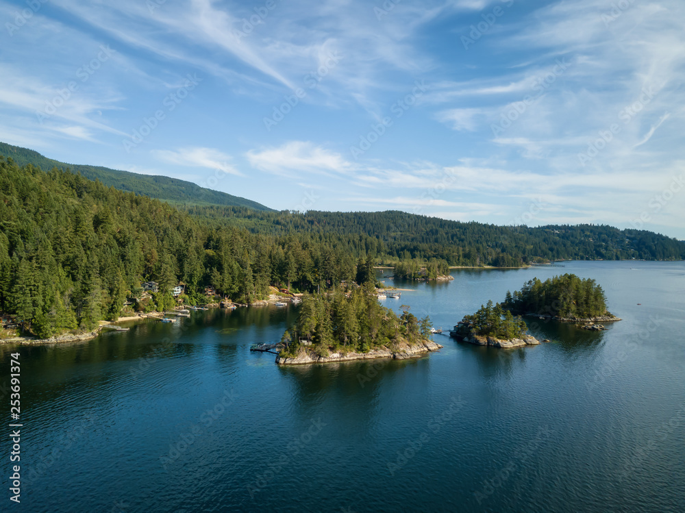 Aerial view of a beautiful inlet during a vibrant sunny summer day. Taken near Sechelt, Sunshine Coast, British Columbia, Canada.