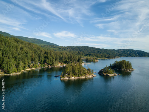 Aerial view of a beautiful inlet during a vibrant sunny summer day. Taken near Sechelt, Sunshine Coast, British Columbia, Canada.