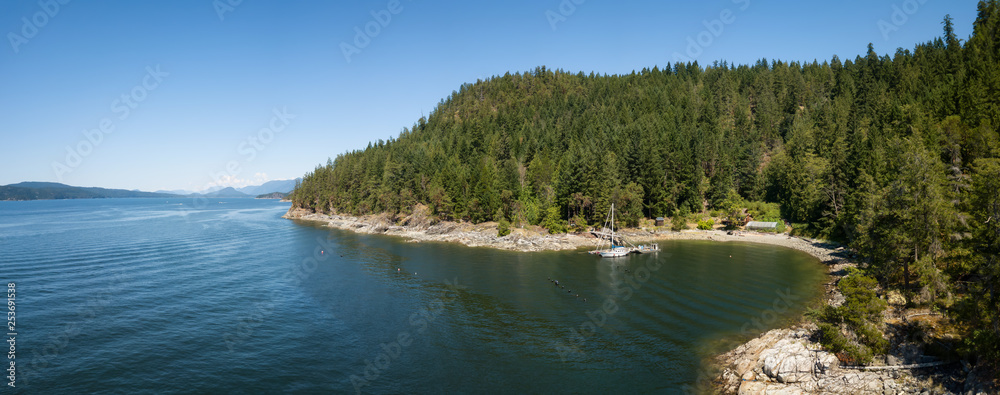 Aerial panoramic view of a rocky coast during a vibrant sunny summer day. Taken near Powell River, Sunshine Coast, British Columbia, Canada.