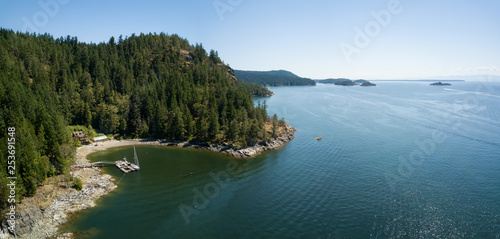 Aerial panoramic view of a rocky coast during a vibrant sunny summer day. Taken near Powell River, Sunshine Coast, British Columbia, Canada.
