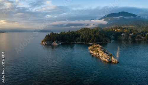 Aerial view of a beautiful Canadian Landscape during a cloudy summer sunset. Taken in Whytecliff Park  Horseshoe Bay  North Vancouver  BC  Canada.