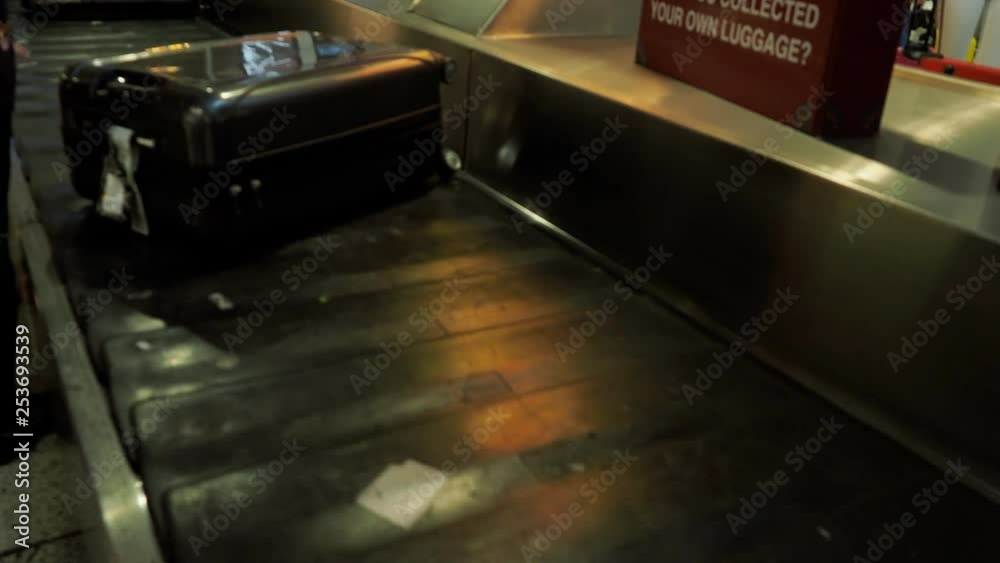Luggage in busy airport terminal Luggage in busy airport terminal
