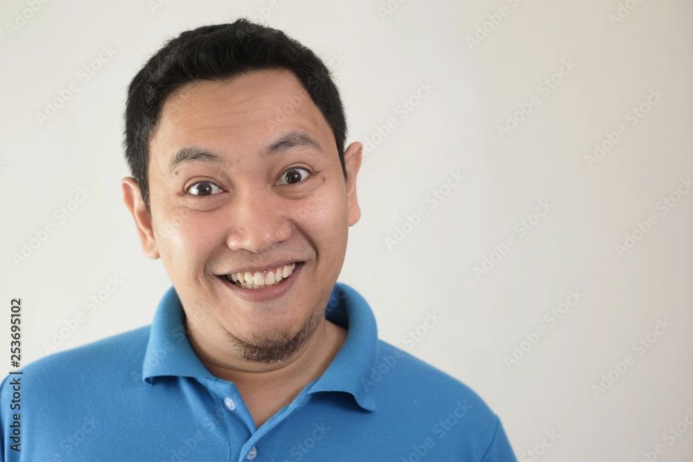 Young Asian Man Smiling Happily Young Asian Man Smiling Happily