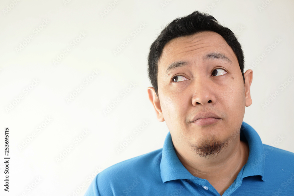 Young Man Thinking and Looking Up, Having Good Idea Young Man Thinking and Looking Up, Having Good Idea