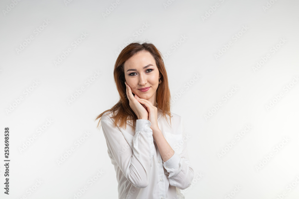 Fashion, style and people concept - pretty young asian woman over white backgroung