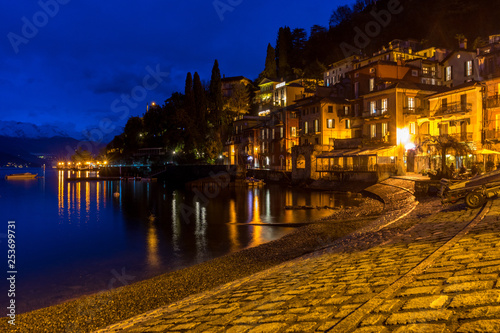 Italy, Varenna, Lake Como, illuminated fishing village at night