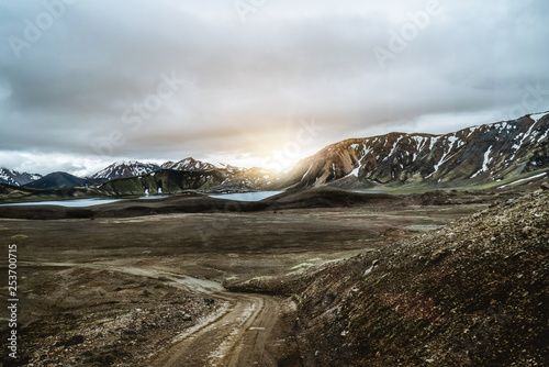 Landscape of Landmannalaugar surreal nature scenery in highland of Iceland, Nordic, Europe. Beautiful colorful snow mountain terrain famous for summer trekking adventure and outdoor walking. photo