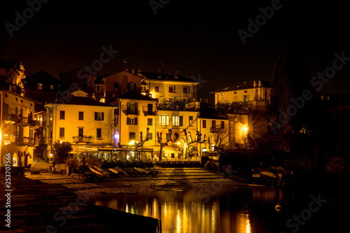Italy, Varenna, Lake Como, a lit up city at night