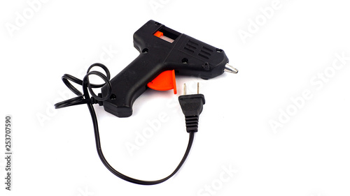 Electric hot glue gun isolated on white background